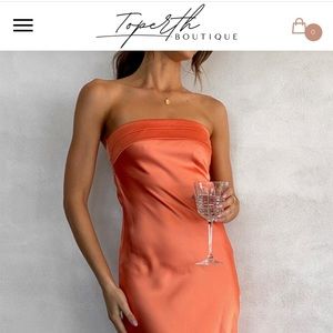 Strapless orange satin dress